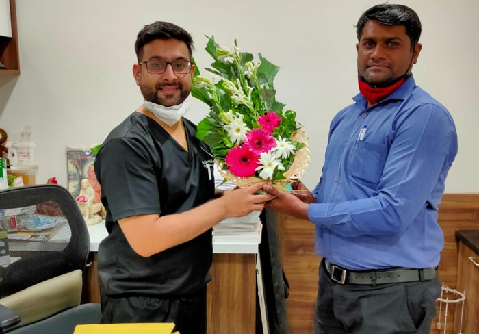 Dr. Ketan Venkhade recieving getsures from happy patients